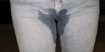 Girl pissing pants at night