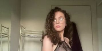 Submissive girl wearing fishnet shows her beautiful body and huge tits