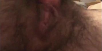Stunnig hairy milf fingers her pussy - closeup