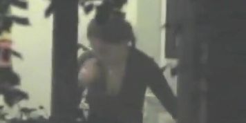 Cute chick caught on cam by a window voyeur.