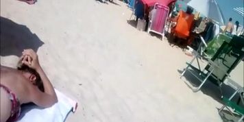 Beach voyeur films woman's asses in bikini