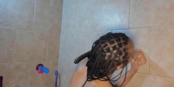 Petite ebony girl Yazmine with tiny tits washes hairy crotch