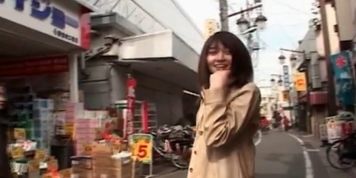 Asian girl walking in public with a vibrator in her undies