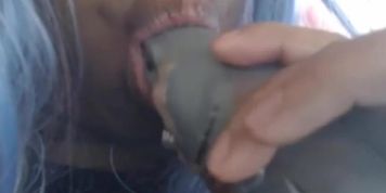 Giantess gnawing on a shark