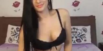 sexy and horny camgirl rubs her pussy for you