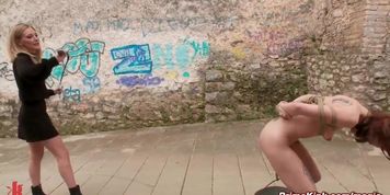 Lilyan Red in a cruel lezdom outdoors then fucked in public bar