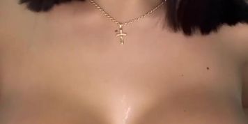 Latina playing with her huge tits