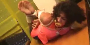 Mature hogtied barefoot re-gagged