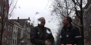 Dutch prostitute sucking tourist before sex