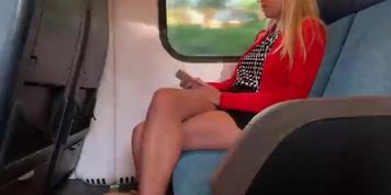 Sexy blond beautiful legs in the train