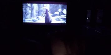 Two girlfriends give a public double blowjob in a movie theatre - FFM (Gotta Love Lucky)
