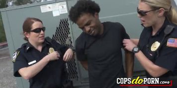 Black rapper gets fucked by two horny cops at a roof after chasing him for having a massive cock