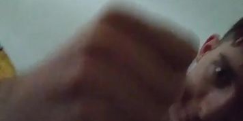 Gay guy masturbates into condom for the day's wear