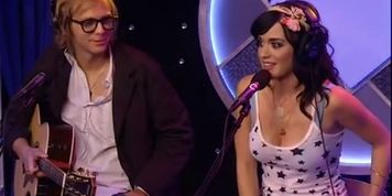 Katy Perry shows her cleavage to Howard Stern, asks Katy Perry to remove her sweater for cleavage (Krystal Boyd)