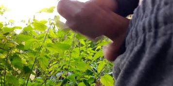 Russian guy publicly pisses and jerks off a dick on the riverbank