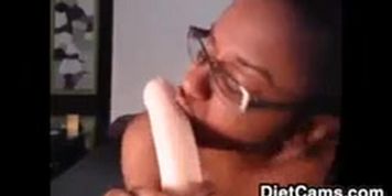 Ebony Teen With Glasses And A Toy