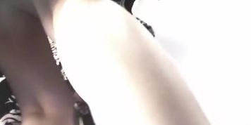 Summer upskirt of the girl in short flowered dress