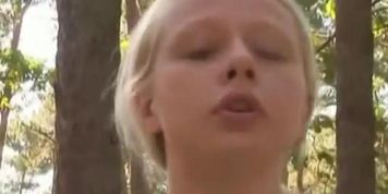 sexy blonde girl pissing outdoors