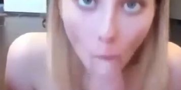 Young amateur giggling while giving head