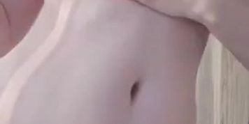 ALITTLENEKKO OILING HER BODY