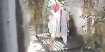 Spying neighbor naked in the backyard