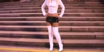 Justyna in short skirt in the night city
