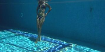 Absolutely astonishing blonde pornstar Mary Kalisy swimming