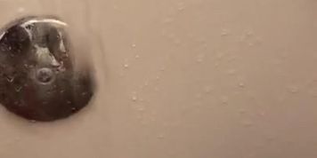 Letting the water play with my pussy while I show off my white toes