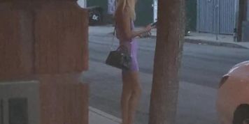 Another Sexy Escort in a tight short dress and heels waiting to get fucked