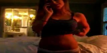 Cute blonde girl strips for her bf on a webcam - video 1