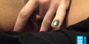 Playing with her fat pussy lips.