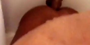 Drew dilating the hole in the shower