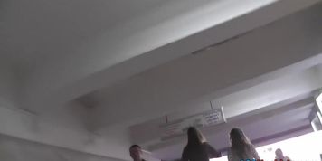 Thong upskirt footage of a slim girl wearing mini skirt