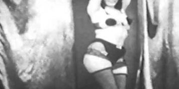 Black and white footage of Betty Page in bondage (Anna Malle)