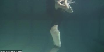 Shaved brunette sissy Irina Polcharova naked in the pool