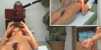 Asian girl enjoying her paid erotic massage for an hour