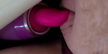 Toy licks exposed clit head...so intense! 