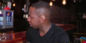 Busty brunette bartender sucks two black dicks and gets fucked