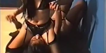Asian catfight in black stocking