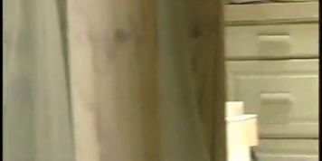 Skinny blonde girl plays with herself in bubble bath