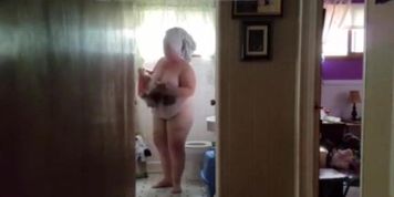 Pig wife gets out of showert to show her 249 pound fat ugly body.
