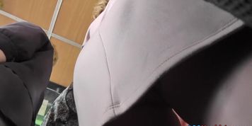 Her office-style skirt lets us enjoy real upskirt view