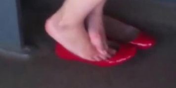 red flats shoeplay in bus