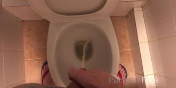 Pissing in a public toilet
