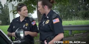 Randy cops arrest a black dude with a huge dick to swallow