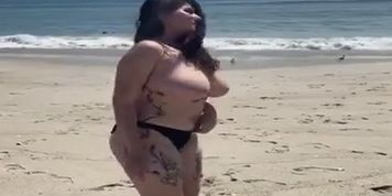 GIRL GOES NUDE ON THE BEACH!!!