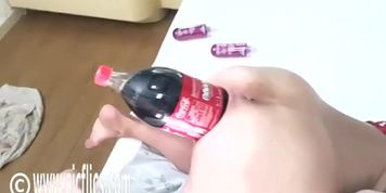 Submissive Latina with a big booty is fucking a bottle