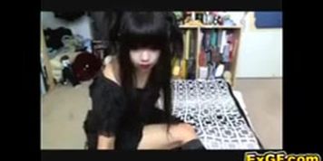 Asian girl Luv Moori fucks her ass with a toy
