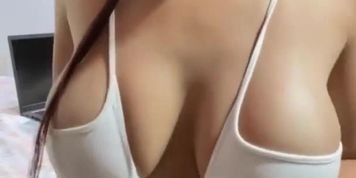 Latina showing her big boobs and rounded butt