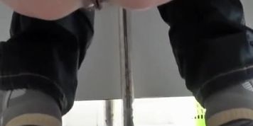 Upclose camera of woman peeing